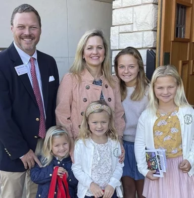 Young family greeters